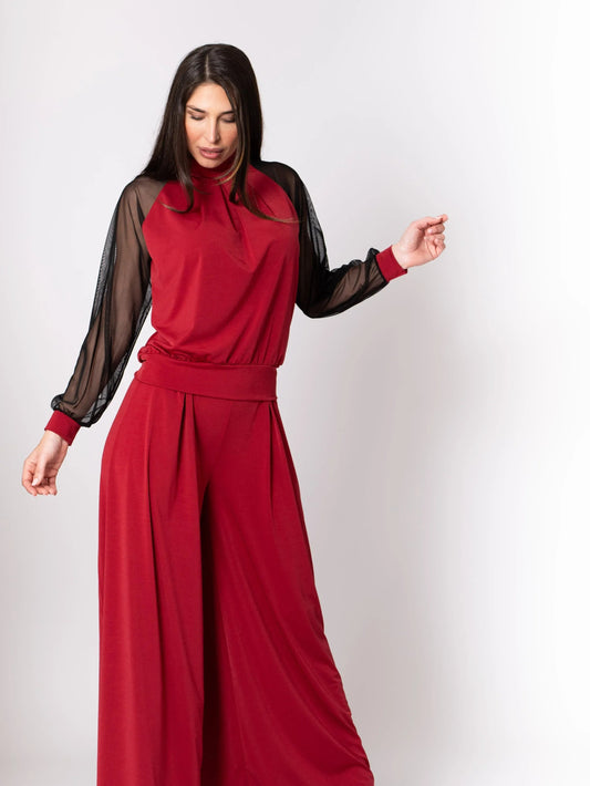 Conjunto pantalón palazzo y top con mangas de tul. Granate