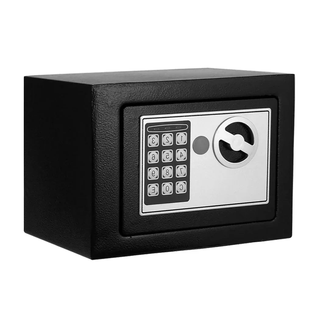 Closed electronic safe with digital keypad on front, placed on neutral background.