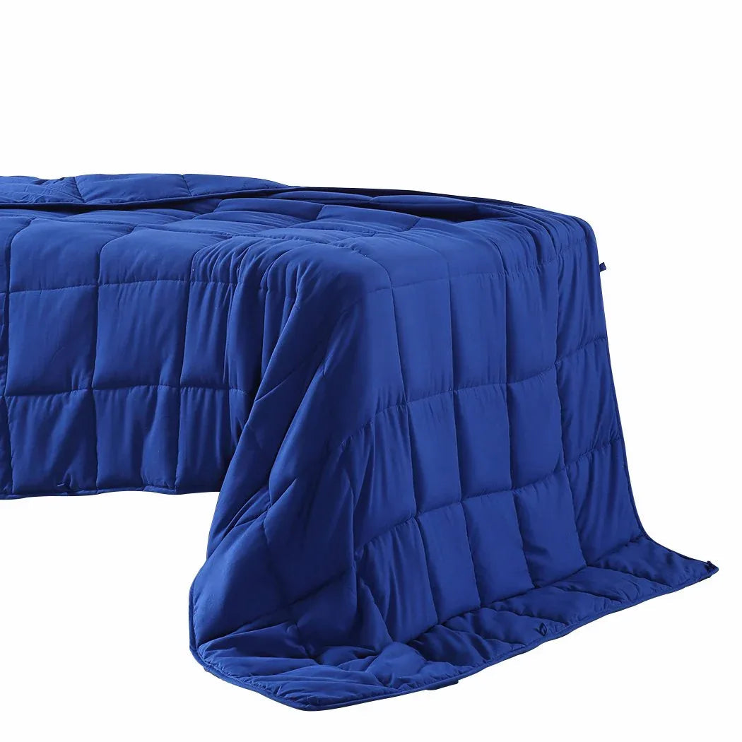 Close-up of navy weighted blanket fabric texture showing soft polyester material.