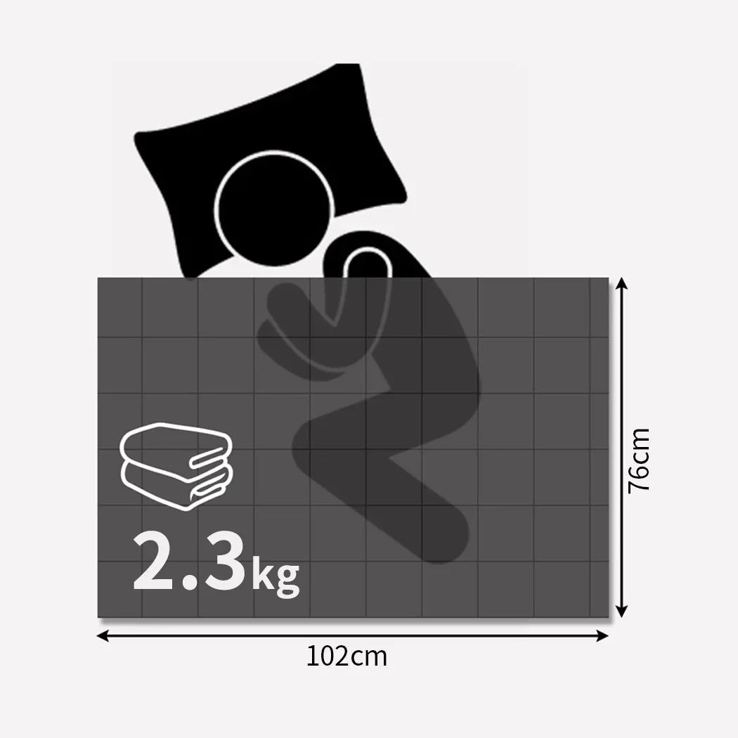 Weighted blanket spread out flat displaying its even distribution and 3-layer design.