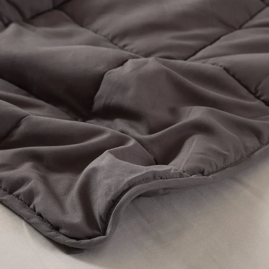 Side view of the weighted blanket showing thickness and filling inside.