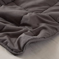 Side view of the weighted blanket showing thickness and filling inside.