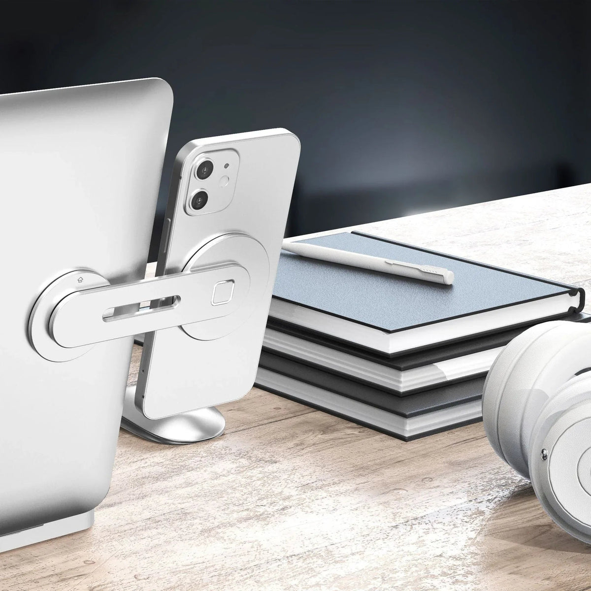 Close-up of the collapsible metal paste base laptop and cell phone mount with suction bracket.