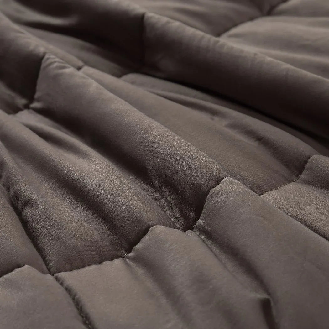 Profile view of DreamZ weighted blanket emphasizing its depth and heavy fill.