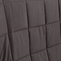Weighted blanket folded with close-up on stitching and fabric quality details.