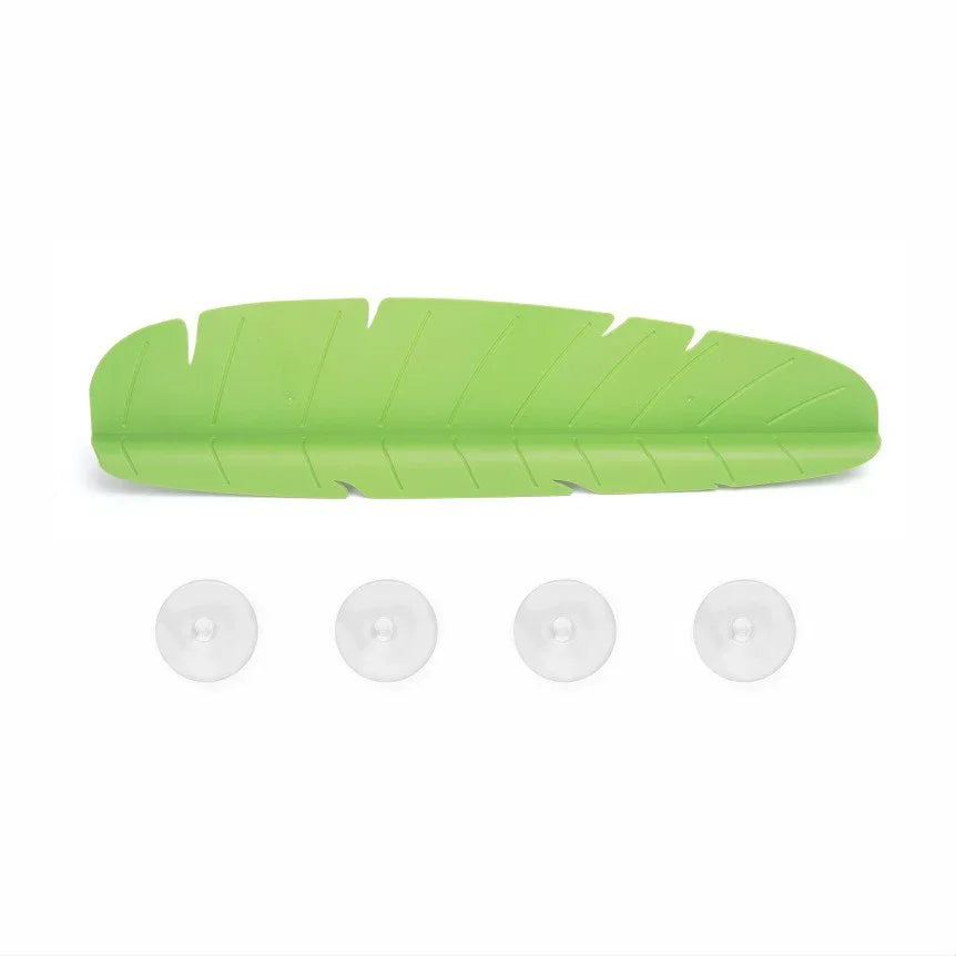 Three silicone splash guards in green, yellow, and white colors displayed side by side.