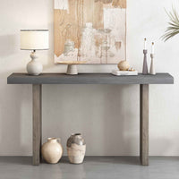Gray oak veneer console table with intricate geometric side panel design in a modern living room.