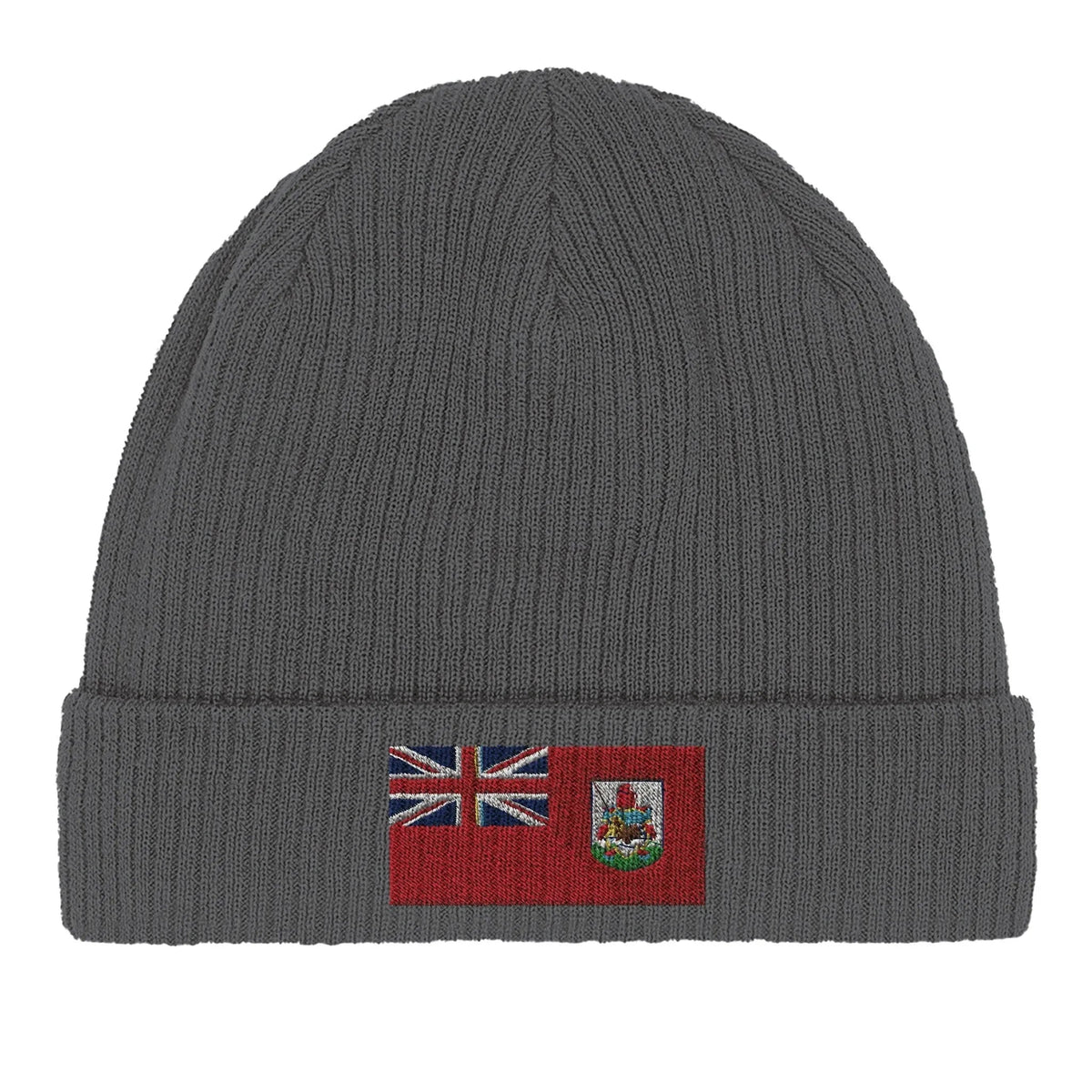 Green organic cotton beanie showing its stretchable ribbed texture