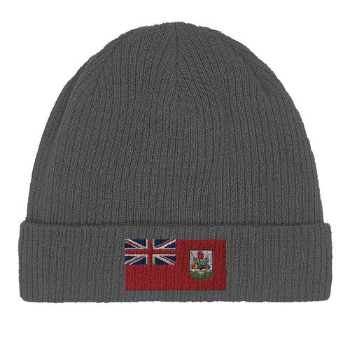 Top-down view of the green organic cotton beanie with Bermuda flag patch
