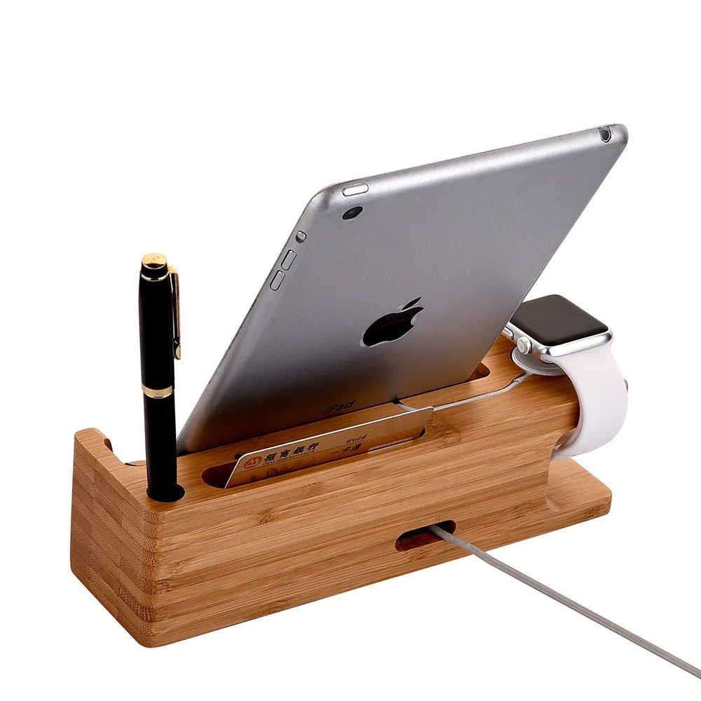 Top view of multifunctional wood storage holder with two mobile phones and watch.
