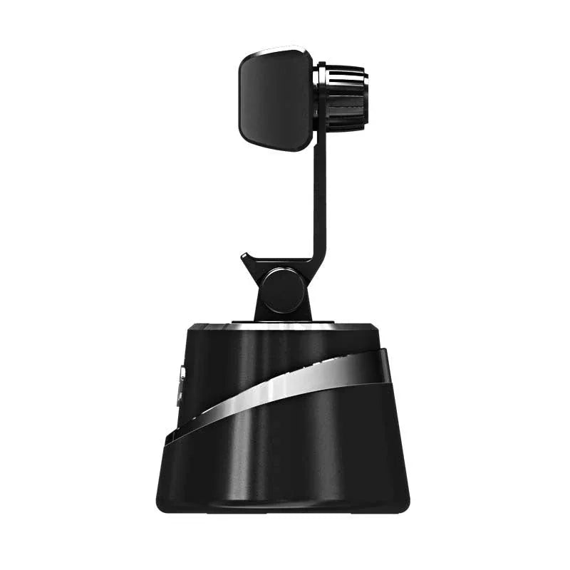 Phone holder tracking a pet with smooth 360-degree rotation on a tripod.