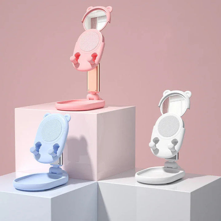 Blue adjustable desk phone holder with mirror, displayed folded on white background.
