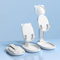 Illustration of phone stand supporting a tablet in adjustable angled position.