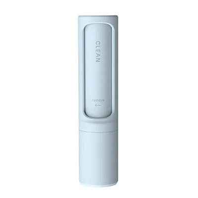 Compact and portable pet hair remover brush suitable for travel or car use.