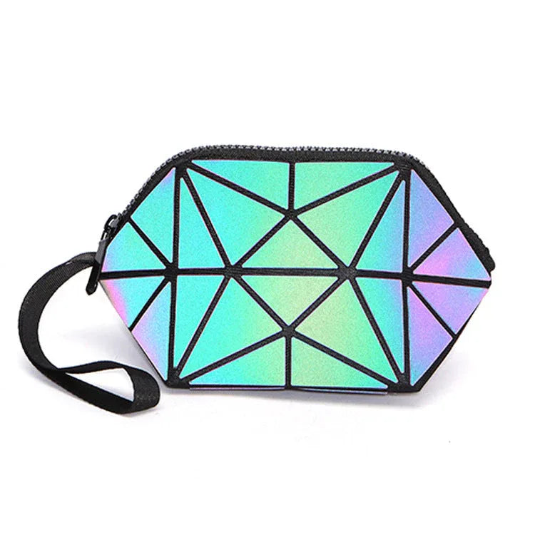 The Lumination Holographic Makeup Bag displayed closed on a white background, showing its shiny holographic surface.