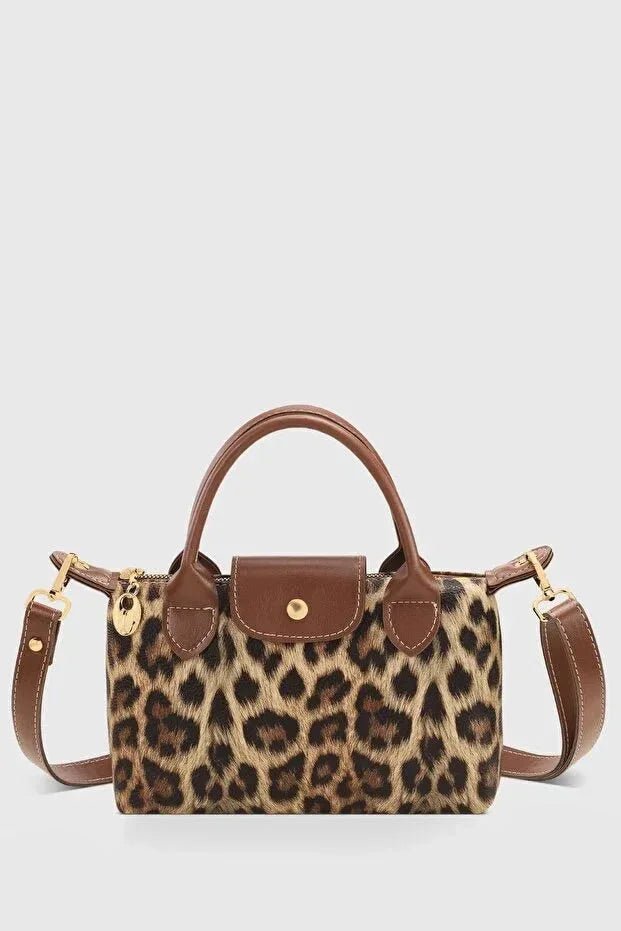 Front view of a black high quality PU leather water resistant crossbody bag for women.
