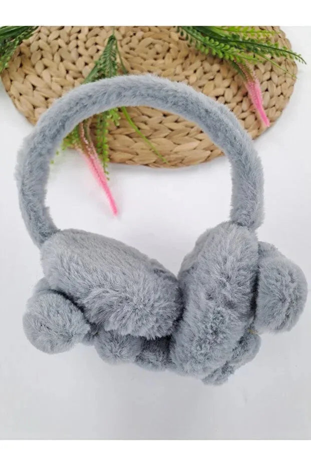 Side view of boys grey puppy earmuffs showing fluffy plush ear cushions