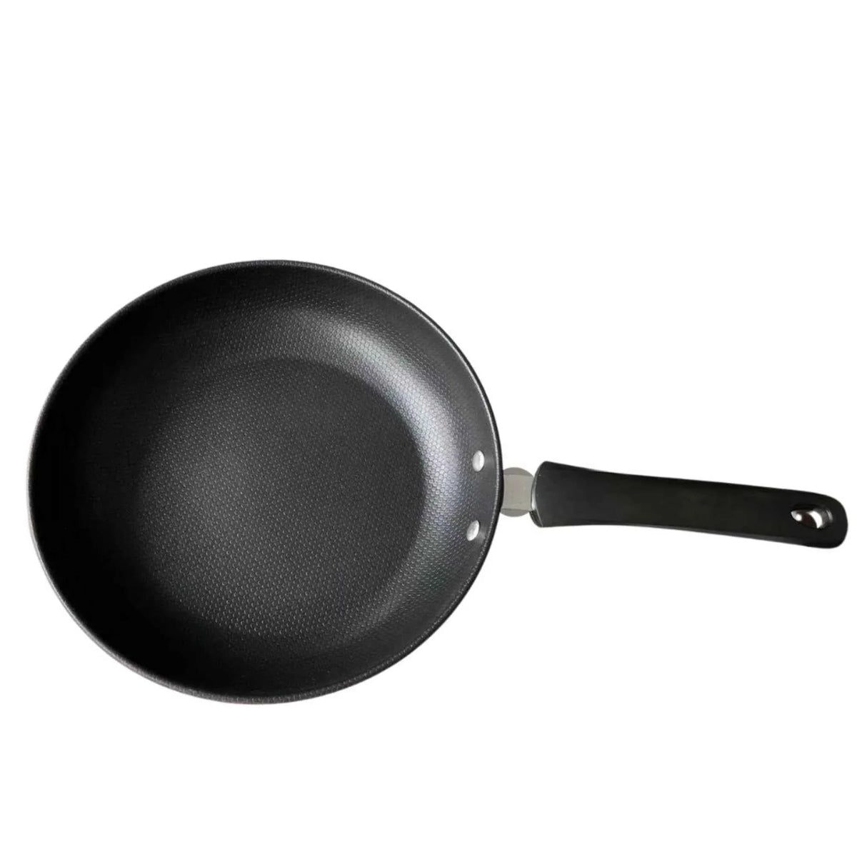 Side angle of Cheftop frying pan highlighting thick carbon steel body and ergonomic handle