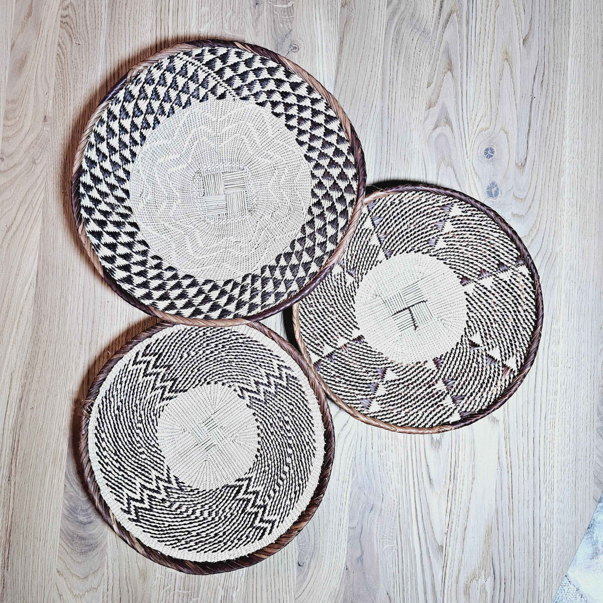 Set of 3 Handmade African Wall Baskets - Zimbabwe Binga baskets with natural woven patterns for boho wall decor