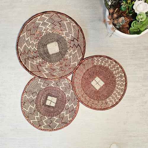 Set of 3 Handmade African Wall Baskets - close-up of intricate hand-woven grass and palm leaf patterns