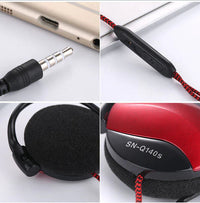 Ear hook headphones coiled neatly with visible 3.5mm plug and microphone.