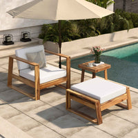 Acacia wood outdoor lounge chair and ottoman set on patio with beige cushions