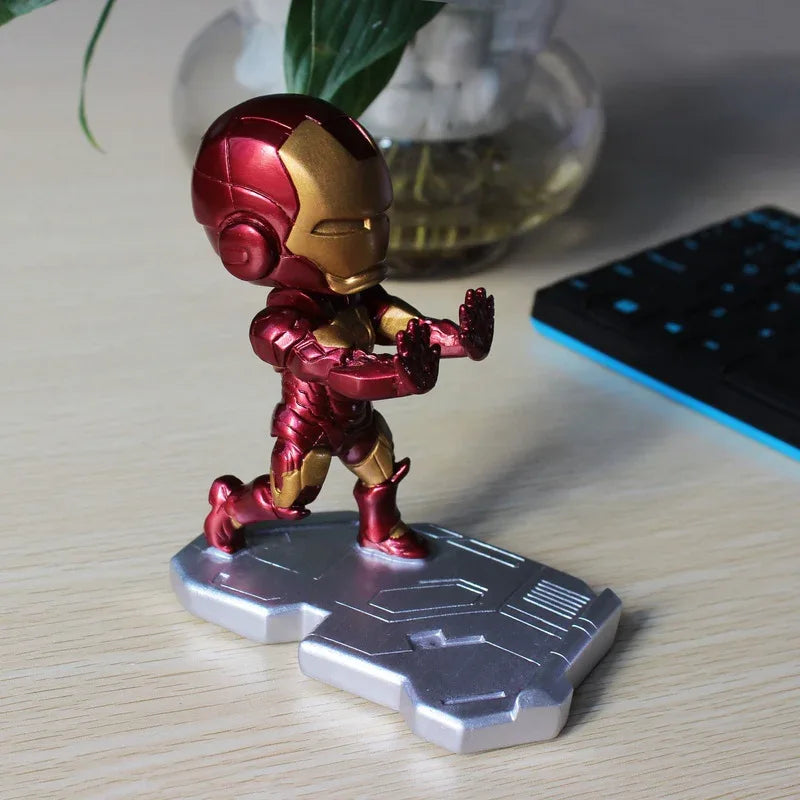Iron Man phone stand displaying the back side with smooth finish and phone resting securely.