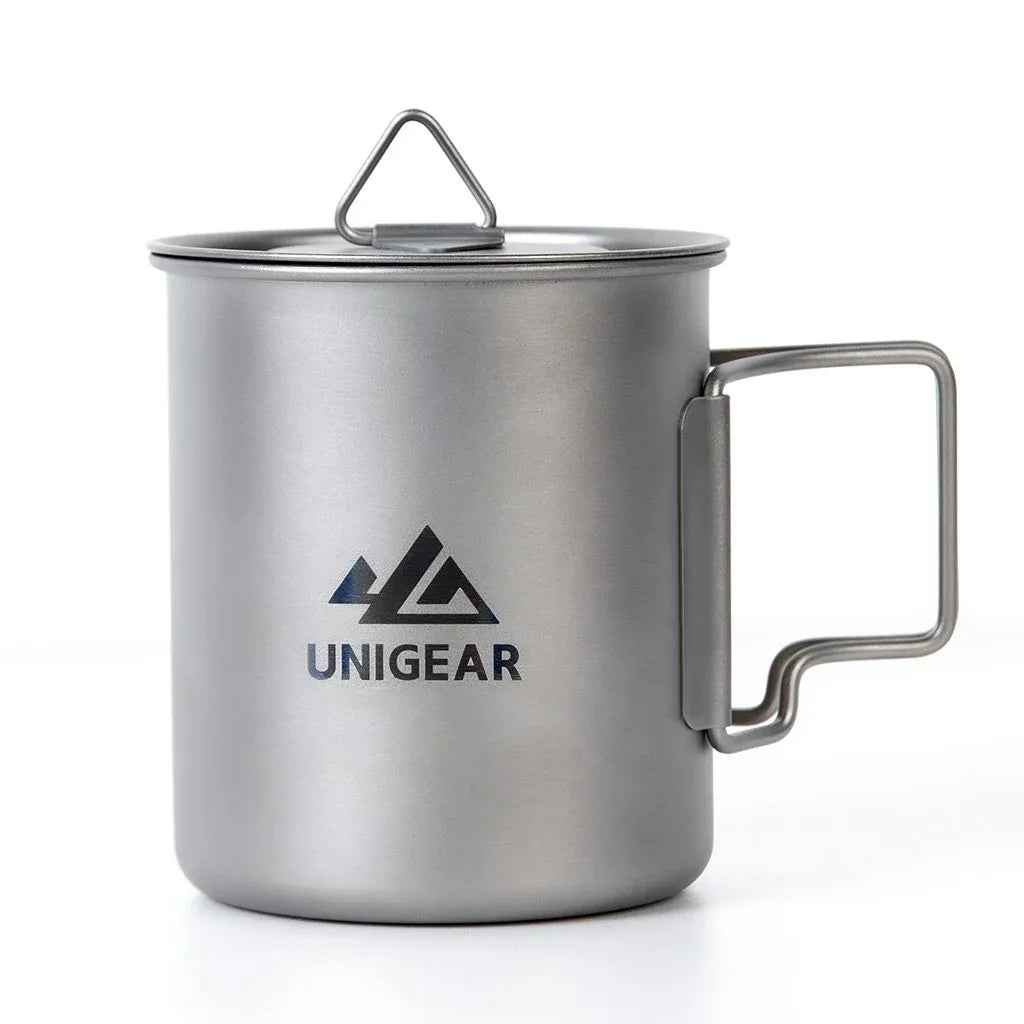 Lightweight titanium camping cup with folding handles, holding 450ml, shown on a plain background.