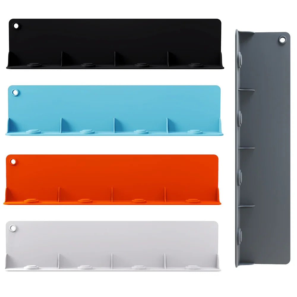 Flexible silicone water baffle curved along edge of sink, showing modern and simple design.