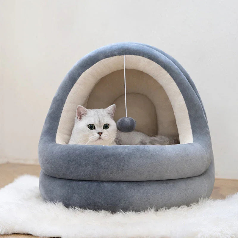 Cozy crystal velvet cat house bed with thick pillows for small pets, shown in a warm beige color.