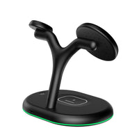 Close-up of the black wireless charger showing magnetic phone charging pad and USB charging port.