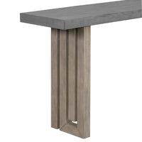 Console table placed against wall with decorative items showing off its distinctive side panel design.