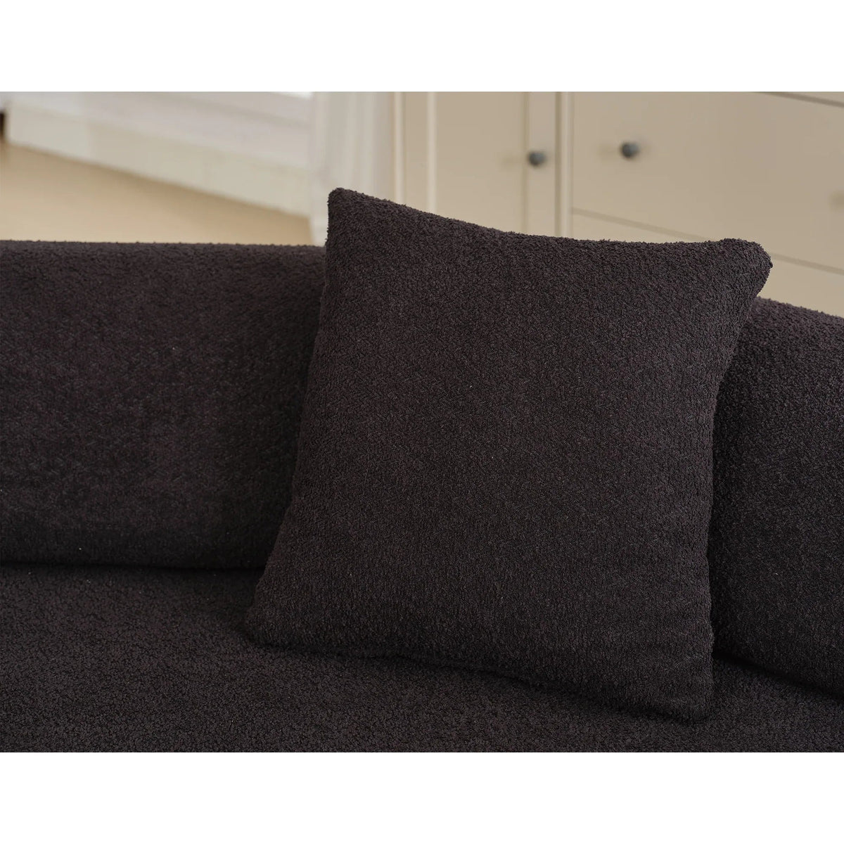 Simple black and white illustration related to design or furniture specifications.