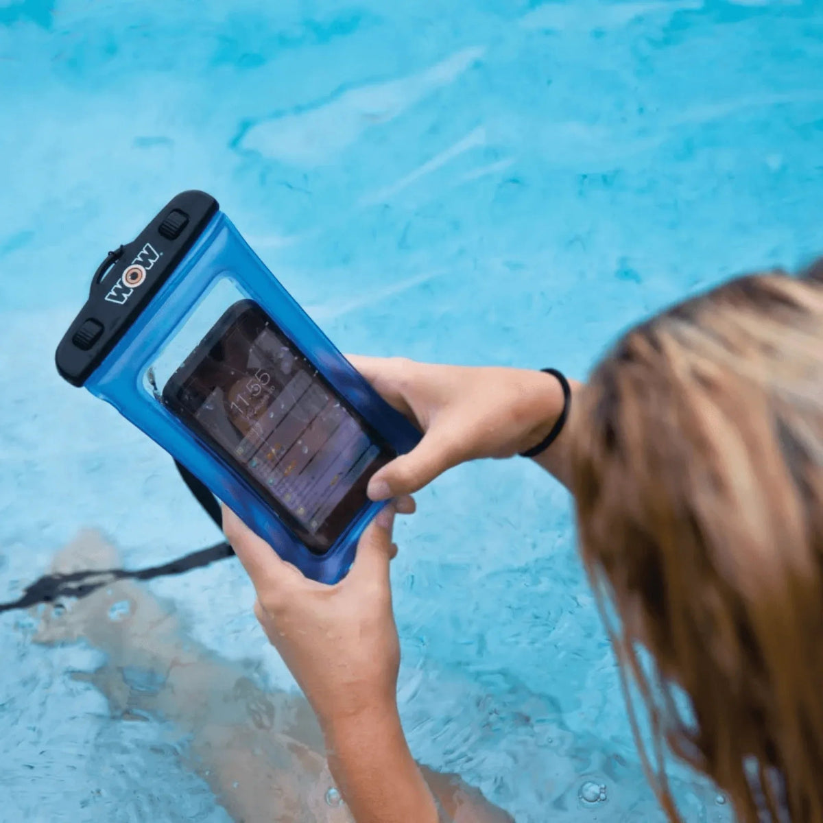 Close-up of waterproof phone holder with a smartphone inside, highlighting the clear front cover.