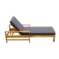 Side view of Acacia wood lounge chair showing adjustable backrest and cushioned seat.