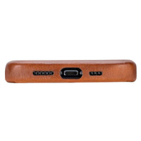 Interior suede lining of brown leather iPhone 15 case highlighting soft protective material