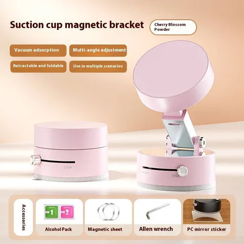 Foldable phone holder demonstrating magnetic and vacuum suction features on smooth glass surface.