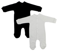 Black and white closed-toe sleep and play long johns for babies, shown folded on white background.