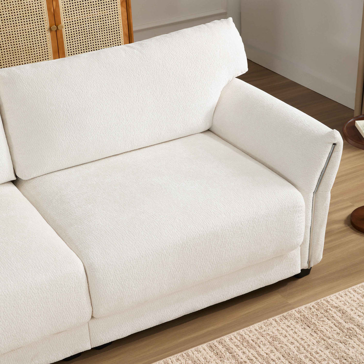 Modern white L-shaped sectional sofa with extra-wide chenille cushions and a built-in USB charging port.
