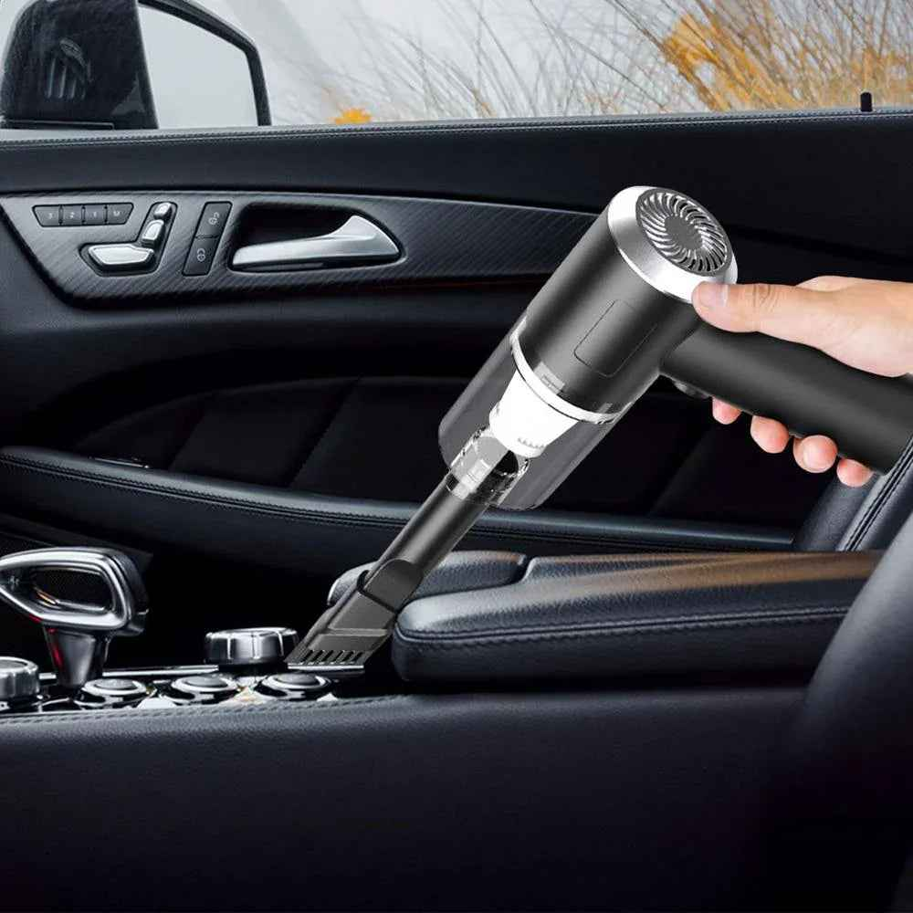 Compact cordless handheld vacuum cleaner resting on a car seat, ideal for quick interior cleaning.