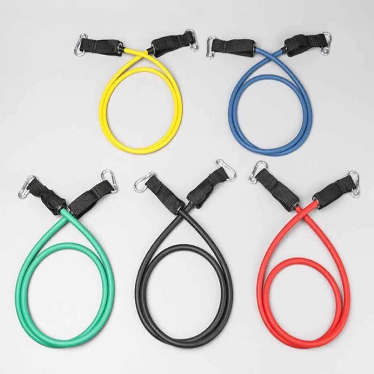 A set of colorful resistance bands with handles, door anchor, and ankle straps arranged on a white surface.