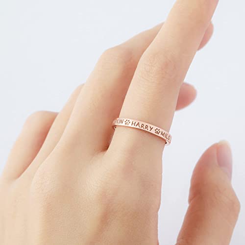 Rose gold plated dog mom ring showcasing engraved pet names.