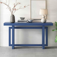 Close-up of wood grain on the table top of a long, navy blue console table.