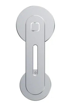 Magnetic phone mount adhered to laptop with a user interacting with both devices.