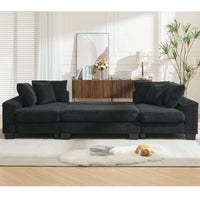Modern black U-shaped sleeper sofa with corduroy upholstery, plush cushions, and a pull-out bed for four.