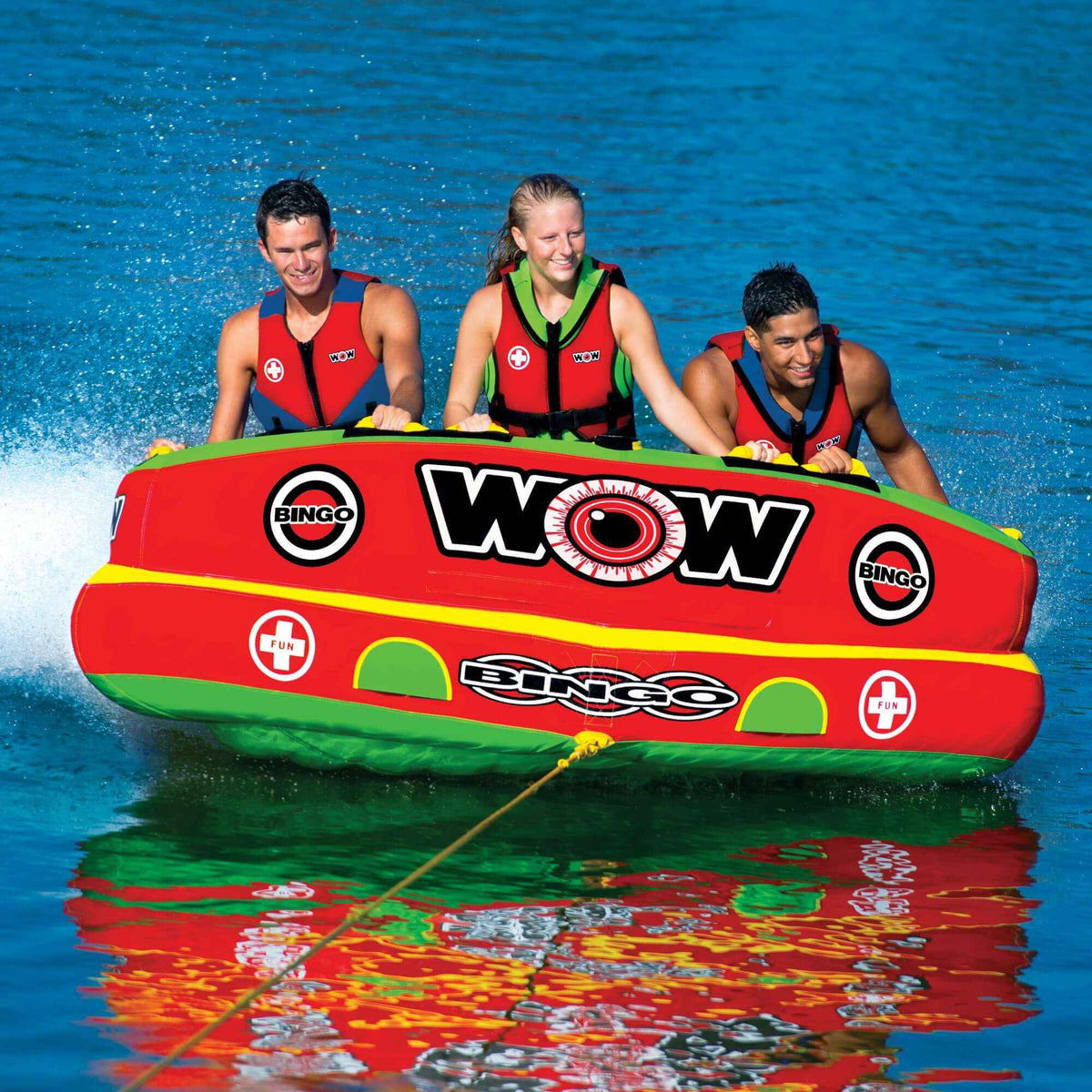 Bingo towable tube floating on water with vibrant colors and comfortable seating visible.