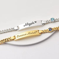 Close-up shot of engraving options and fonts for customizing the sterling silver toddler bracelet.