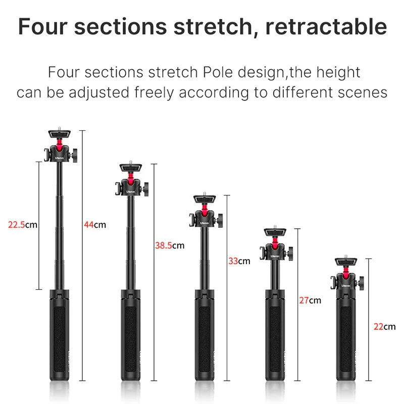 Tripod in compact form with folded legs resting on a flat surface.