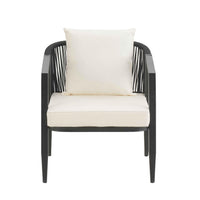 Table and four beige cushioned chairs with sturdy iron frames set outdoors ready for patio use.