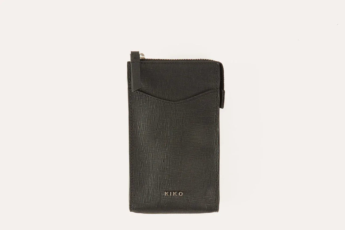 Genuine saffiano leather crossbody phone wallet with zip closure and slim profile in soft pink.